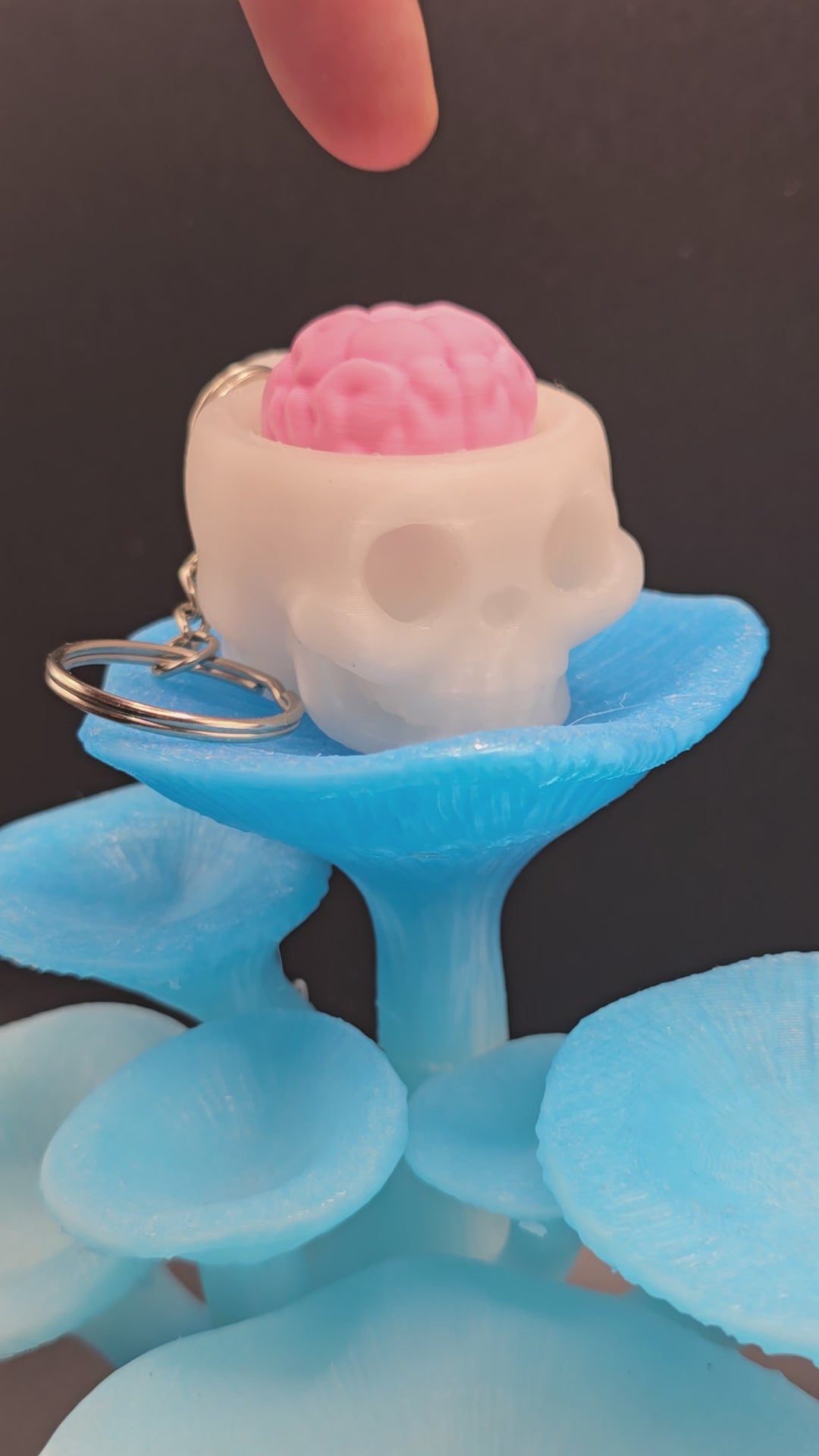 Skull with brain clicker keychain